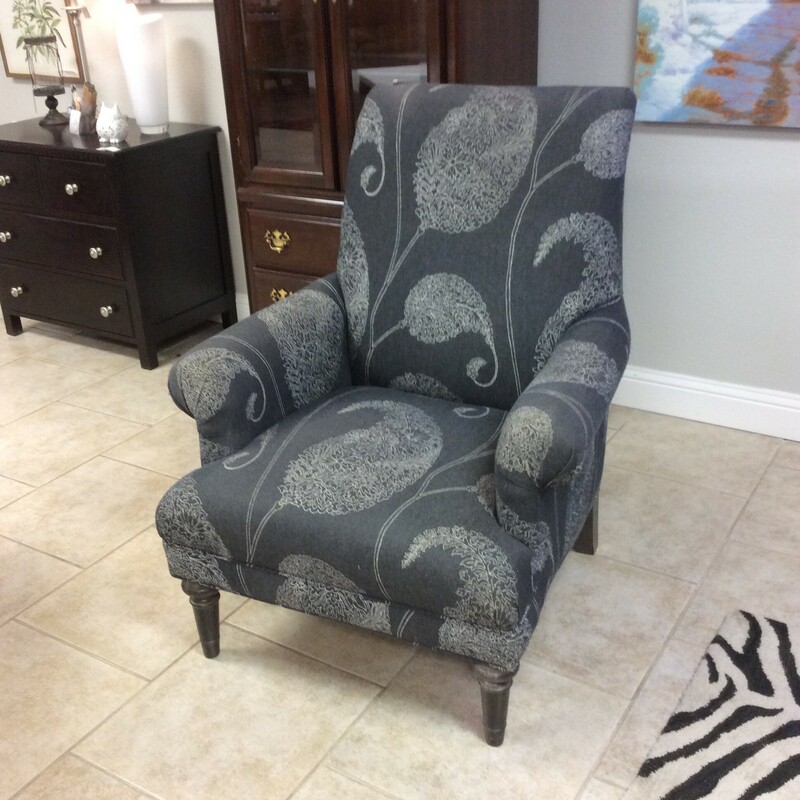 This is a Dark Grey with White Pasley Detail Linen accent Chair. This Accent Chair feautres dark wooden feet.
