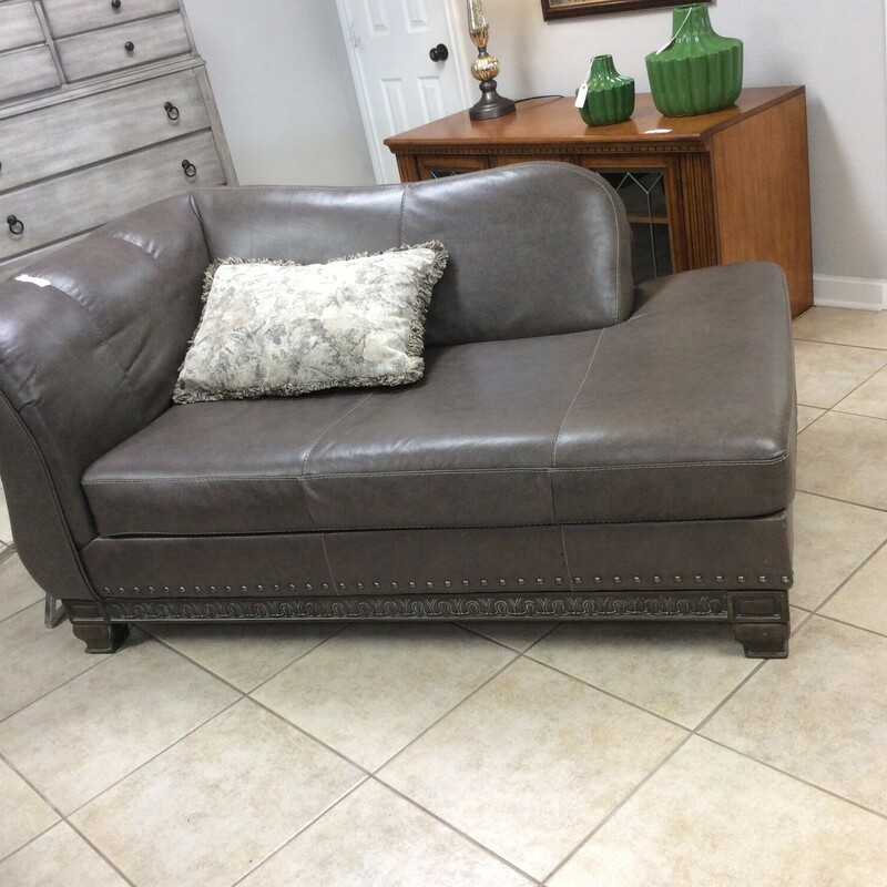 This is a Beautiful Grey Leather Chase Lounge with a White detail Stiching. This Chase has nail head trim along the bottom and Washed Grey Wood on the bottom with White Arch detailing.