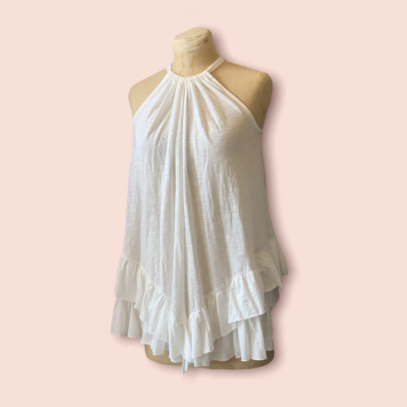 This adorable tunic top is comfy and breathable for the summer! The adjustable straps tie in the back for a wide variety of sizing.