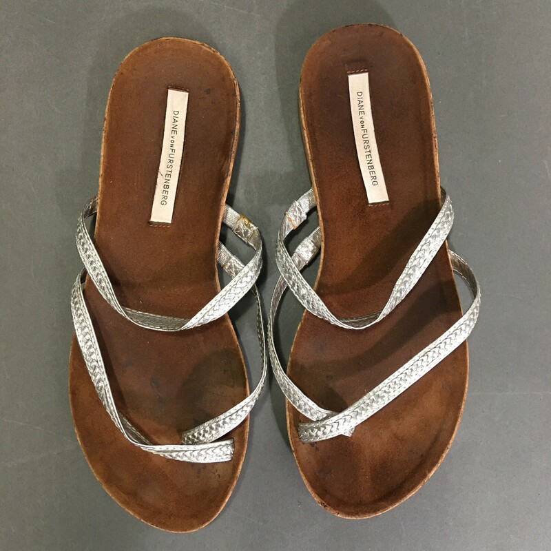 Diane Von Furstenberg, Silver, Size: 8  Adelia Braided Strap Flat Sandals -Silver Metallic slip on  toe strap sandals on a cork sole.<br />
Insole shows gently used good condition, sole is practucally unmarked..<br />
 9.7 oz