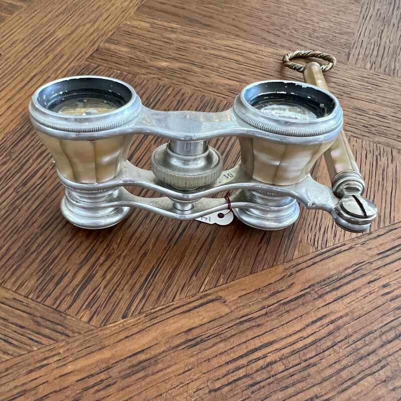 Antique Mother of Pearl Opera Glasses with folding handle. Still work perfectly!<br />
Will ship USPS Priority mail.