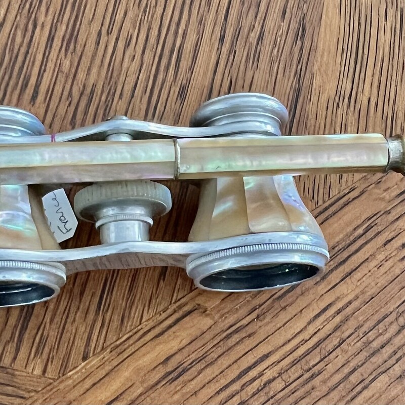Antique Mother of Pearl Opera Glasses with folding handle. Still work perfectly!
Will ship USPS Priority mail.