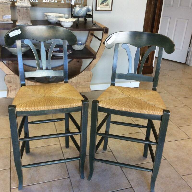 This set of two barstools is done in a Hunter Green  distressed painted finish with rush seats.