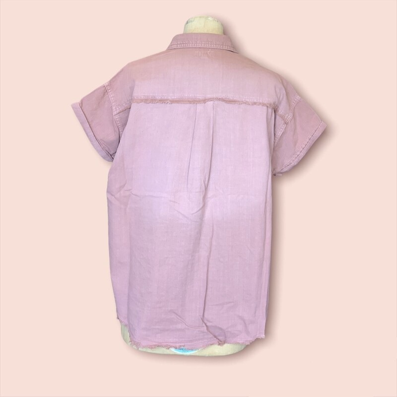 This gorgeous mauve shirt is madeof a denim material and has a lovely floral pattern on the front!