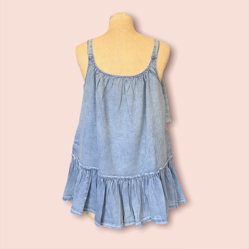 This denim babydoll tank is perfect for summer! It is made of a light, breathable denim and has accommodating, adjustable straps!
