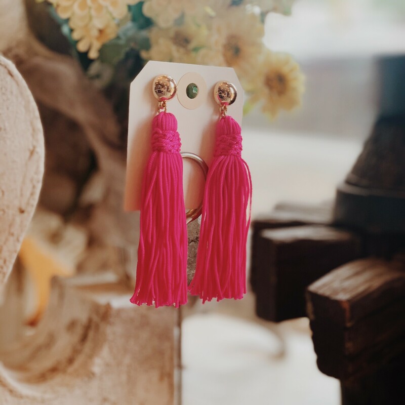 These vibrant hot pink tassel earrings measure 3.75 inches in length!