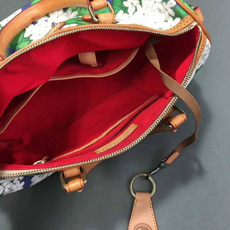 Dooney & Bourke Daisy, Floral, Size: Medium<br />
Material<br />
<br />
Printed All Weather Fabrics,  white Daisy clusters with<br />
green leaves and blue background,.Dooney & Bourke Purse with shoulder strap<br />
Blue with white and green flowers.<br />
Dooney & Bourke Daisy, Floral, Size: Medium<br />
Material<br />
<br />
Printed All Weather Fabrics,  white Daisy clusters with<br />
green leaves and blue background,.Dooney & Bourke Purse with shoulder strap<br />
Blue with white and green flowers<br />
<br />
1 lb 11.4 oz