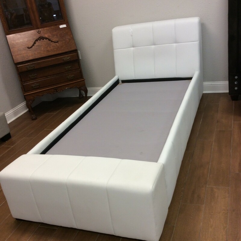 This is a beautiful White Leather Twin Platform Bed. This Bed has has a square pattern along the leather.