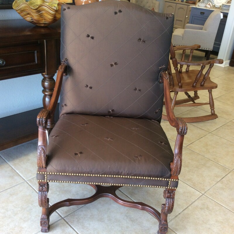 This is a beautiful Sherrill Dragon Fly Arm Chair. This Chair has a Brown Sheer Like Fabric with Drangon Flies on it. This Chair has Nailhead trim and Dark Stained Detailed Arms and Legs.