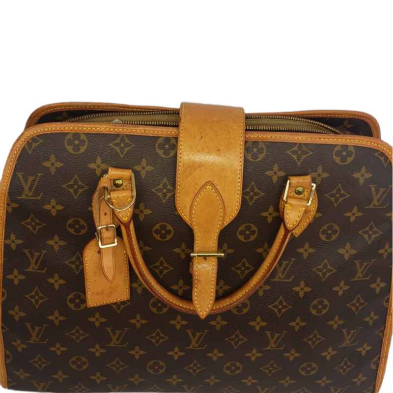 Louis Vuitton<br />
<br />
Rivoli 1997<br />
<br />
 Monogram<br />
<br />
Lots Of Pockets: Great Work/computer Bag.<br />
<br />
Condition: Good. Some Marks on Vachetta.