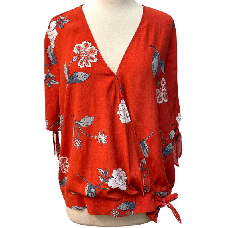 Loft Floral Top with Front Tie
Orange, White, and Blue
Size: Large