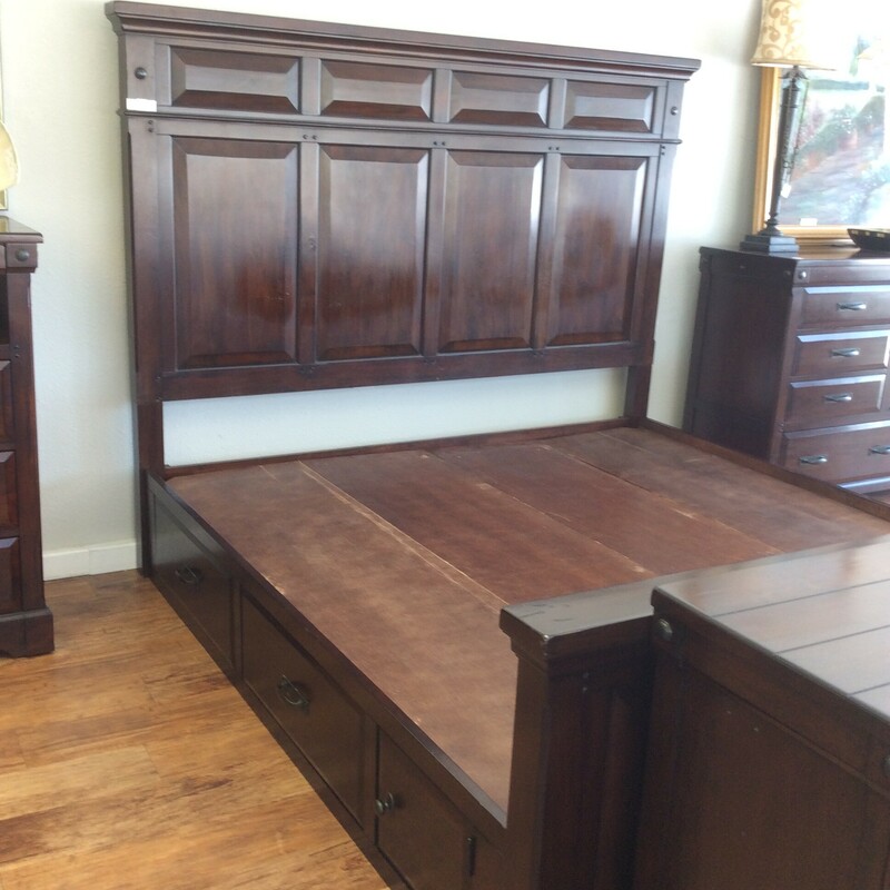 This is a 4 Piece Avalon King Bedroom Set. This Set included a King Bed with Storage. A 8 Drawer and Cabinet Dressor. And 2, 3 drawer Night Stands. This pieces has a Dark Cherry Finish and Metal Button Detailing.