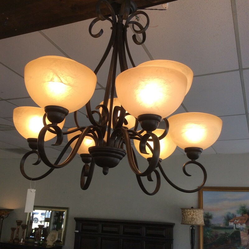 This 9-arm Chandelier has a bronze metal finish with faux alabaster glass shades.