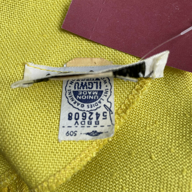 This is something I could see Twiggy wearing.  It is so cute.<br />
Yellow Dress from the 1960s.<br />
Short Sleeves<br />
Dropped Waist<br />
The fabric is a slubby linen or linen blend, no fabric tags present<br />
Center back<br />
Unlined<br />
union made<br />
By Madison<br />
<br />
Here are the flat measurements, please double where appropriate:<br />
Shoulder to shoulders: 16<br />
armpit to armpit:19<br />
Waist: 18<br />
Hip: 21<br />
Length: 34<br />
<br />
Thank you for looking.<br />
#47939