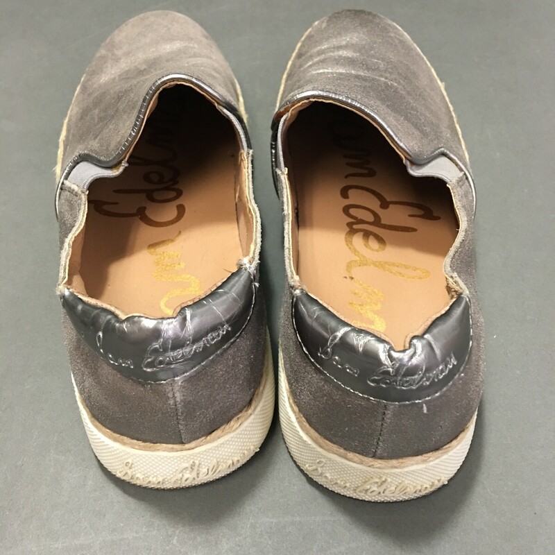 Metallic Slip On Skater Silver, Size: 7.5<br />
 Metallic Slip On Sneaker 7.5 with braided Juke trim - bnice condition - sole shows some wear, tread and \"brand name\" still intact. insole very clean - barely worn<br />
1 lb 2.4 oz