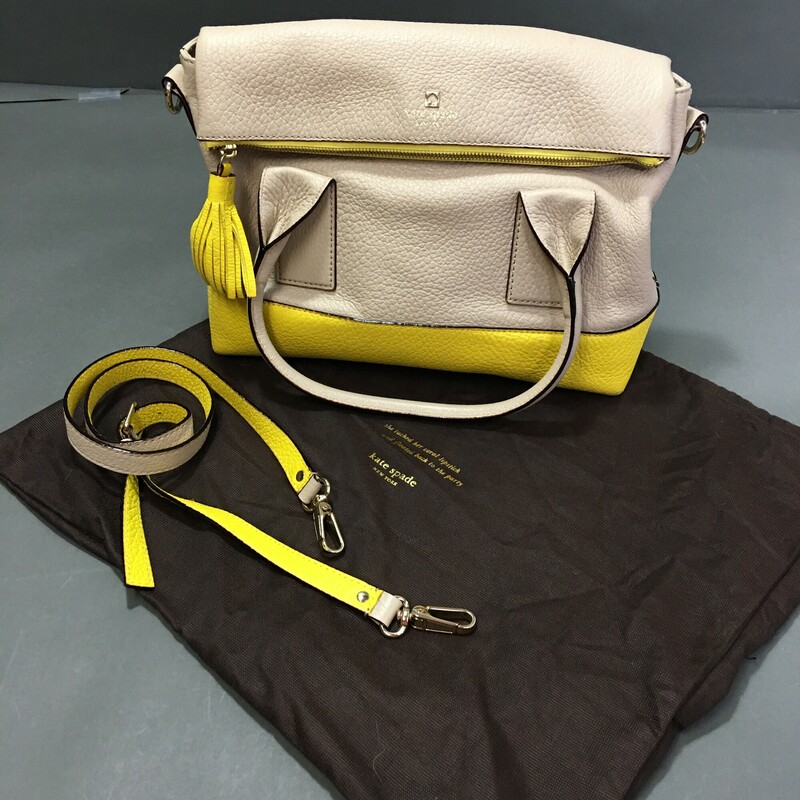 Kate Spade Southport Avenue Carmen, 2 tone Lemon Yellow and Sand pebble embossed cowhide leather satchel.
All zippers working, features 14-karat light gold plated hardware and custom woven book black and white stripe lining.
One inner zip with two pouch pockets, a larger zip pocket in fold over section. Tassel detail on zipper, magnetic closer, removable and adjustable crossbody strap, satchel handles.Sold with 2 tone shoulder strap and includes a Kate Spade dust bag. It measures 10''h x 15''w x 5''h with handle drop length of 5.5'' and a 16.5'' strap. This bag has some gentle wear ont he base corners where leather has worn.  A great bag!

2 lbs 3.2 oz