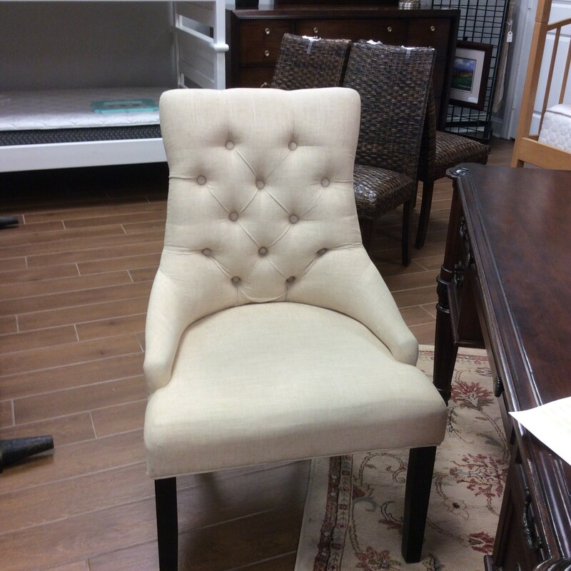 This is a Bassett Ivory Tufted Accent Chair. This Chair has a beautiful Antique Old London Pattern and Nailhead Trim on the Back.