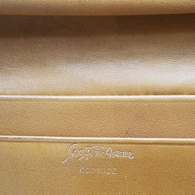 Vintage from the 1970s<br />
BEAUTIFUL and amazingly RARE....these pieces are a gem to offer! Made even more rare in that it's an American made piece - by French Company of California - AND - Private Labeled for SAKS FIFTH AVENUE!<br />
Authentic, as always, and wears Saks Fifth Avenue embossing in gold script in an inner pocket<br />
A bit of history - these wonderful USA produced pieces were crafted from about the 1970's through the 1990's in order to assist LV in keeping up with the extremely high demand for their products here in the USA. They collaborated and partnered with French Company of California - a luxury luggage producer - and Vuitton licensed them during these years. All pieces produced through French are absolutely authentic and a treat to find available due to their limited time of production! Additional info is available online from several sources if you might enjoy researching it further!<br />
#33277  Wallet $300