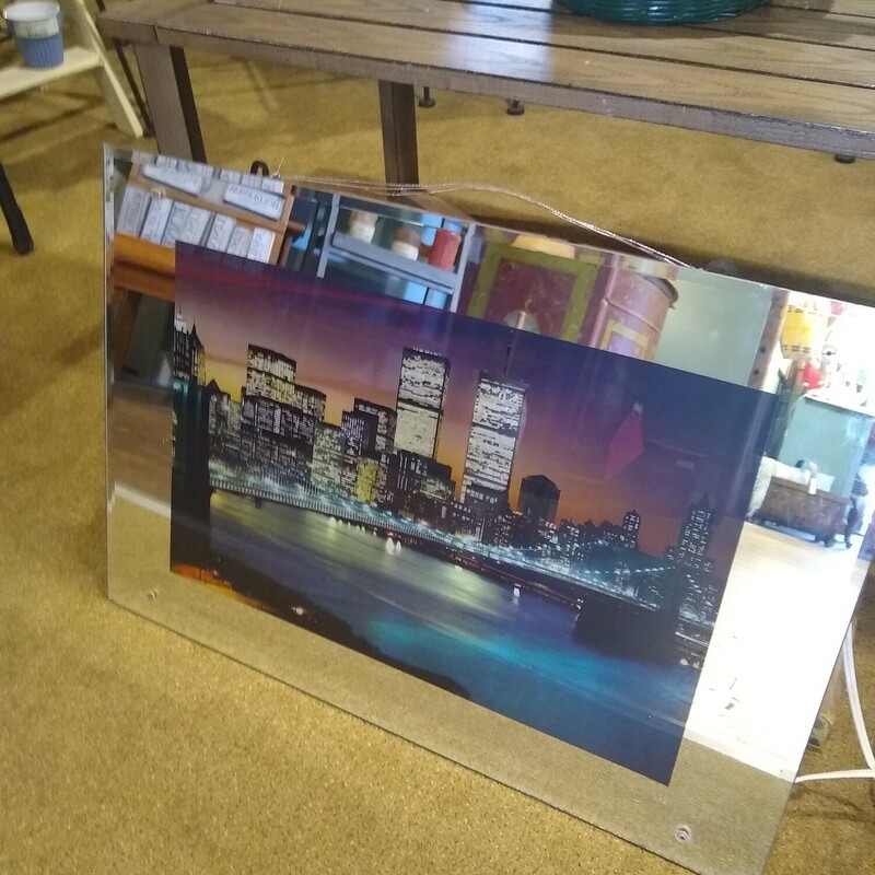 NY City Light Up Picture

Unique picture of NY city with the Twin Towers.  Picture lights up!

Size: 26 in wide X 3 in deep X 18 in high
