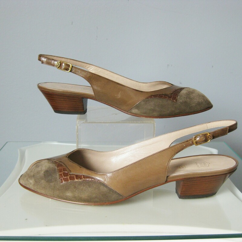 Vtg Bruno Magli Slings, Taupe, Size: 7.5<br />
chic open toe suede slings made with mixed leathers, snake, calf and suede in warm cocoa taupe<br />
They're by Bruno Magli and this model was known as Allis<br />
They were made in Italy.<br />
1 5/8 wedge stacked heel, leather outsole<br />
Size 7.5<br />
Excellent condition: they have been worn as shown on the bottoms,  uppers are in like new condition.<br />
<br />
<br />
Thanks for looking!<br />
#46206<br />
<br />
US buyers: If you don't need the box, lmk before you purchase, provide your zip code and I can shave a little off the price.
