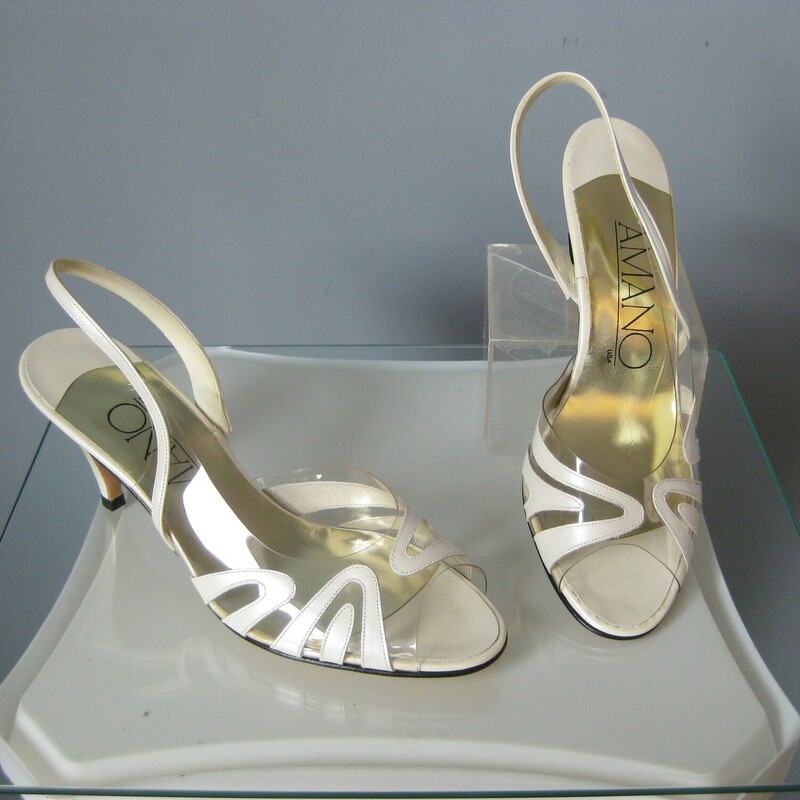 Vtg Amano Clear Slings, White, Size: 8<br />
Sexy but subtle dressy slingbacks in white leather with a mix of clear vinyl.  By Amano, this model is called Hi Tide.<br />
They're brand new in their orginal box.<br />
Made in the USA<br />
size 8<br />
heel: 3 1/8<br />
 Thank you for looking!<br />
#45256