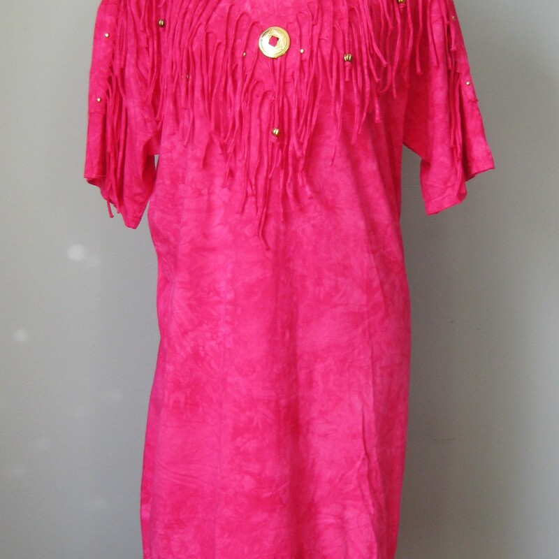 Melodys Western, Pink, Size: Large
You are a Glam Cowgirl at the beach in this fun tee shirt dress from the 1980s.
Hot Pink with a fringed yoke and hem and little gold charms sprinkled about.
The fabric is 100% cotton knit, just like a medium weight t-shirt material, it's subtly tie dyed as you can see in my close up photos.
big shoulder bads, made in the USA
Marked size L, but it might be more comfortable on a modern size Medium, you decide - measurements below!

Flat measurements:
Shoulder to Shoulder: 17.5
Armpit to Armpit: 23
Waist: 22.5
Hip: 22.5
Length: 38.5

Perfect condition!

Thanks for looking.
#42859