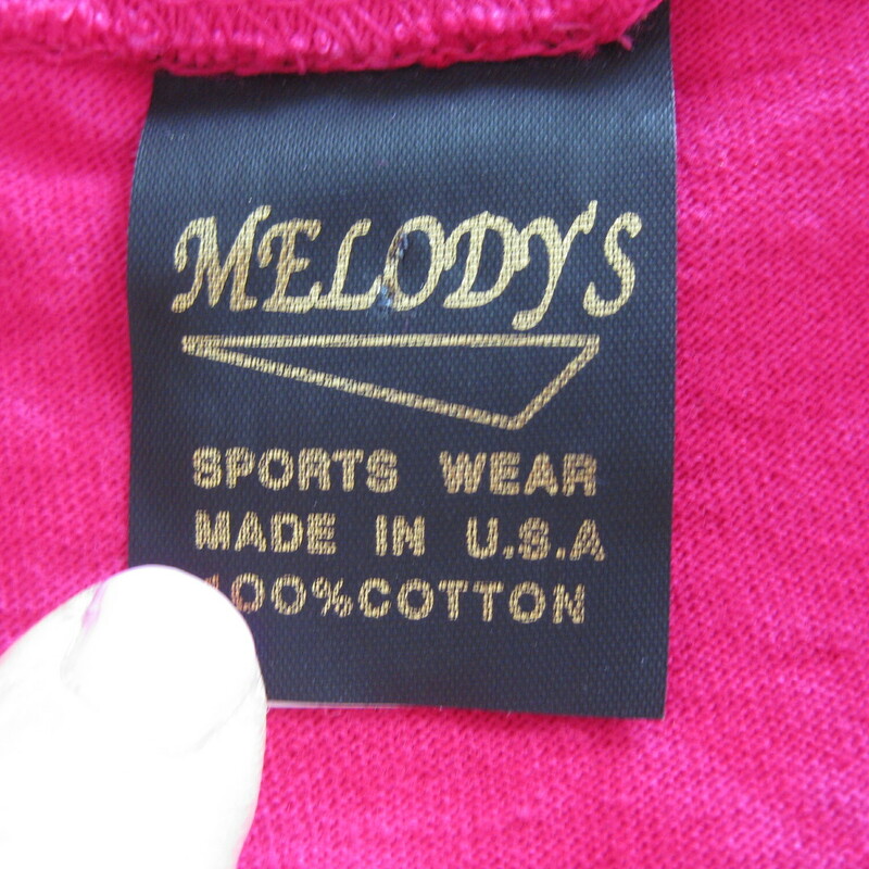 Melodys Western, Pink, Size: Large
You are a Glam Cowgirl at the beach in this fun tee shirt dress from the 1980s.
Hot Pink with a fringed yoke and hem and little gold charms sprinkled about.
The fabric is 100% cotton knit, just like a medium weight t-shirt material, it's subtly tie dyed as you can see in my close up photos.
big shoulder bads, made in the USA
Marked size L, but it might be more comfortable on a modern size Medium, you decide - measurements below!

Flat measurements:
Shoulder to Shoulder: 17.5
Armpit to Armpit: 23
Waist: 22.5
Hip: 22.5
Length: 38.5

Perfect condition!

Thanks for looking.
#42859