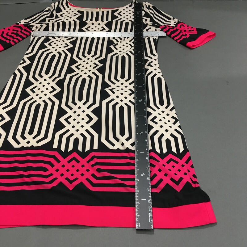 Eliza J White Black Pink, Pattern, Size: 6<br />
Eliza J Chevron Shift Dress, zip back, Size 6 Colorful geometric print white black and pink. Sleeves and hemline are edged with a flat pink fabric in slightly different pink shade,   Polyester Blend,  Lined, Knee Length, 3/4 sleeves. Nice weight.<br />
11.5 oz