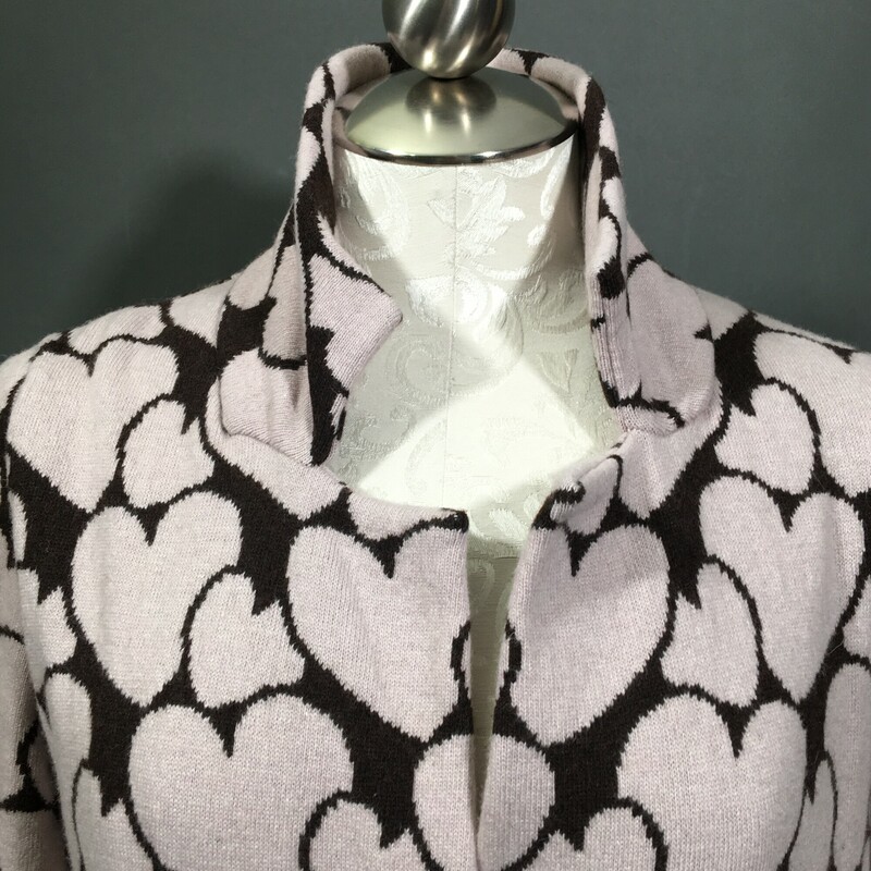 LOVE Moschino Knit, Pattern, Size: 6<br />
Brown with pattern of pale dusty rose hearts. Long Sleeves, 3 buttons, 2 outside pockets, Falls at knees.<br />
40% virgin wool, 29% viscose, 15% nylon, 10% cashmere, 7% angora,  dry clean only<br />
1 lb 4.4 oz