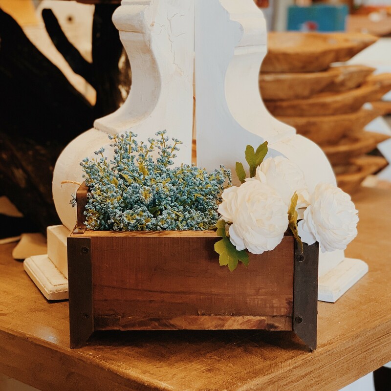 These wooden boxes are perfect paired with florals in any space! They measure 5 inches tall with 1.5 inch high metal handles, 10.5 inches wide, and 6.5 inches deep.