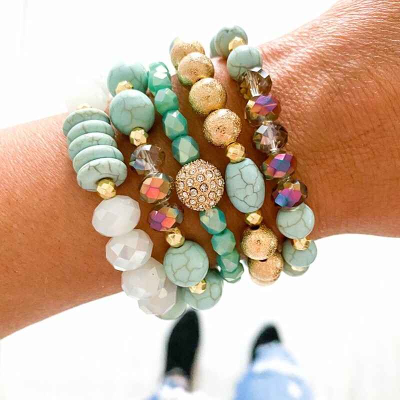 Savvy Bling Turquoise

Our stack collections will come with 5 separate bracelets to create a unique stack. All bracelets are one size fits all. Each bracelet is made of the finest glass beads, hematite, and crystal beads to create longevity and a beautiful sparkle