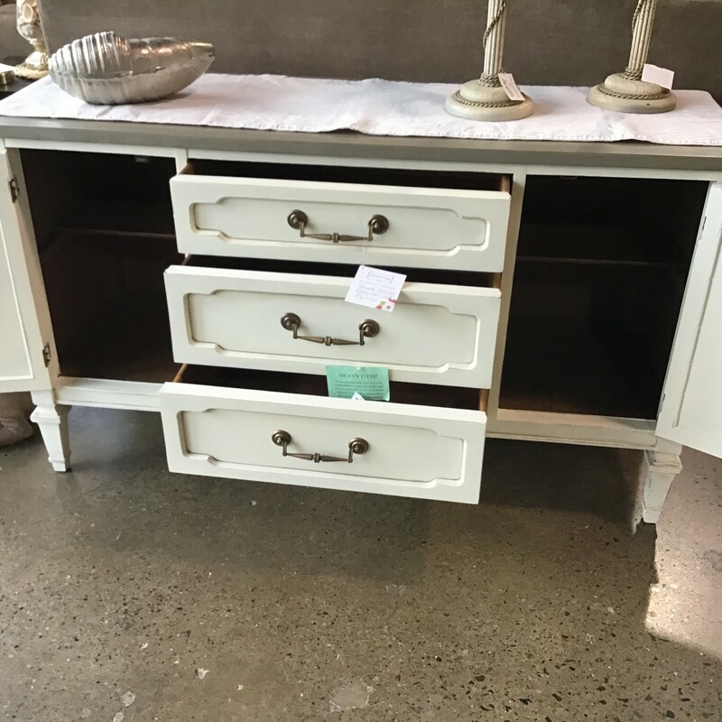 This gorgeous chest has been updated by our local artist using Country Chics Vanilla Frosting paint on the bottom and a wash of Rocky Mountain on the top. The top has been protected with poly and the hardware is bronze. Great piece for behind a sofa, in a bedroom or as a hall piece. Would even be great as a media stand!
Dimensions are 50 in x 17 in x 29 in