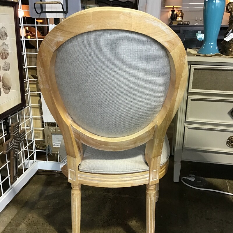 This round back upholstered chair features a driftwood frame and gray upholstery.<br />
Dimensions are 21 in x 19 in x 40 in