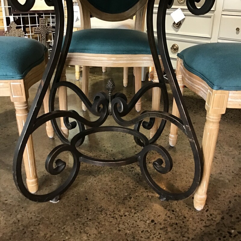 This beautiful round table has a driftwood finish on the table top and a beautiful metal iron base. The chairs have the driftwood frame and the seats and back are upholstered in a gorgeous teal fabric. This set is simply gorgeous!<br />
<br />
Table Dimensions are 54 in x 31 in<br />
Chair Dimensions are 21 in x 19 in x 40 in