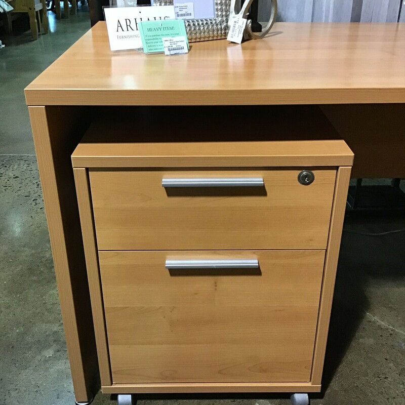 This beautiful desk system from the Rio Collection of Arhaus Furniture is gently used and would make a great desk for your office. The desk is finished on all 4 sides so is able to stand in the middle of a room.  These Rio pieces derive their structural integrity from core compressed hardwoods. This material is highly resistant to warping, cracking and splitting. All joints are reinforced with camlock construction, screws and glue. Camlock is a type of construction that uses metal to metal connections. All drawers feature European metal glides that allow for easy movement. There is no key for the file drawers. We also have 2 bookcases that match this set and are sold separately.<br />
<br />
Overall Dimensions (in L shape) - 92-1/2 in x 104-1/2 in x 29 in<br />
Left Desk Dimensions - 63 in x 31-1/2 in x 29 in<br />
Corner Piece Dimensions - 31-1/2 in x 31-1/2 in x 29 in<br />
Right Desk Dimensions (has keyboard tray) - 71 in x 31-1/2 in x 29 in<br />
(2) 1 Drawer and 1 File Drawer Wheeled unit - 19-1/2 in x 19 in x 25 in<br />
Tower wheeled tray - 11 in x 19-1/2 in
