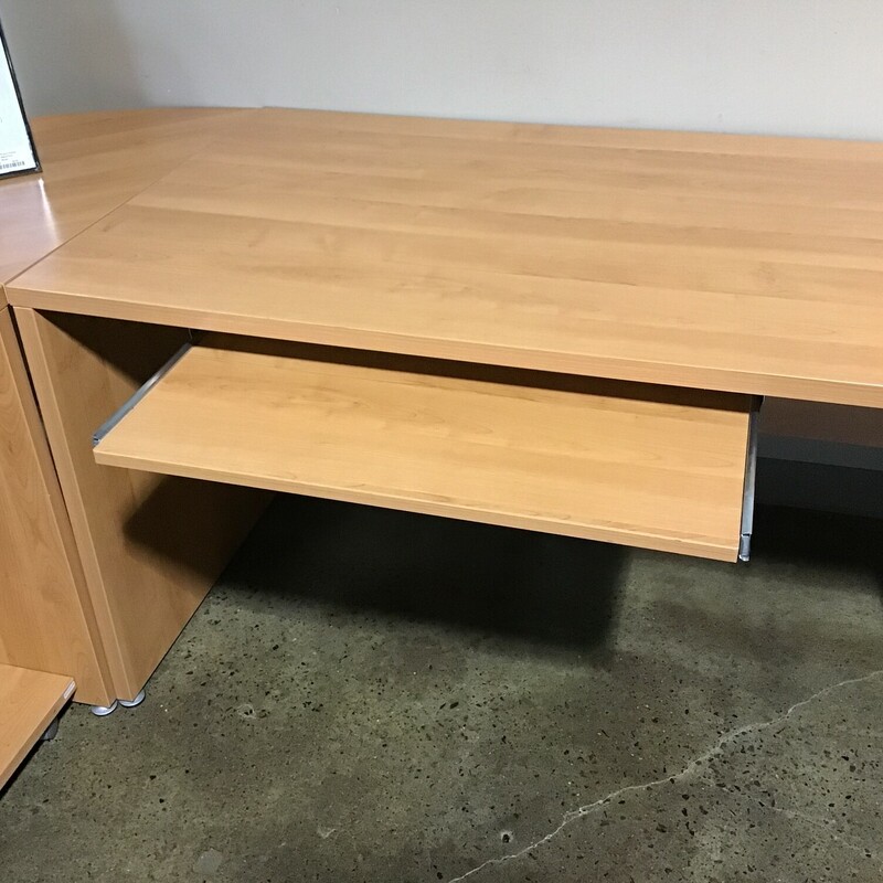 This beautiful desk system from the Rio Collection of Arhaus Furniture is gently used and would make a great desk for your office. The desk is finished on all 4 sides so is able to stand in the middle of a room.  These Rio pieces derive their structural integrity from core compressed hardwoods. This material is highly resistant to warping, cracking and splitting. All joints are reinforced with camlock construction, screws and glue. Camlock is a type of construction that uses metal to metal connections. All drawers feature European metal glides that allow for easy movement. There is no key for the file drawers. We also have 2 bookcases that match this set and are sold separately.<br />
<br />
Overall Dimensions (in L shape) - 92-1/2 in x 104-1/2 in x 29 in<br />
Left Desk Dimensions - 63 in x 31-1/2 in x 29 in<br />
Corner Piece Dimensions - 31-1/2 in x 31-1/2 in x 29 in<br />
Right Desk Dimensions (has keyboard tray) - 71 in x 31-1/2 in x 29 in<br />
(2) 1 Drawer and 1 File Drawer Wheeled unit - 19-1/2 in x 19 in x 25 in<br />
Tower wheeled tray - 11 in x 19-1/2 in