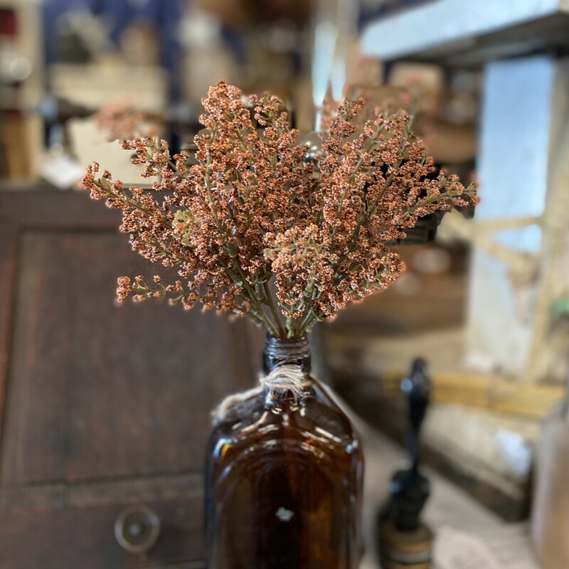 This pretty stem has pumpkin-colored astilbe buds on a green; plastic stem. It is a simple way to add a fall floral touch to any room and looks great in a jar; milk can or with decorative pumpkins. Pair with our pumpkin astilbe half sphere to create a festive fall display.  Stem measures 10.5 inches high by 6 inches wide