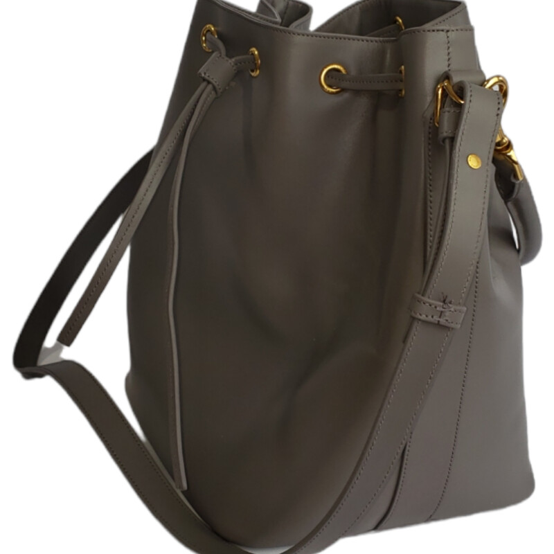Yves Saint Laurent Emmanual Bucket Bag<br />
<br />
Color: Grey<br />
<br />
Condition: Like New<br />
<br />
Material: Leather<br />
<br />
Size: Bucket