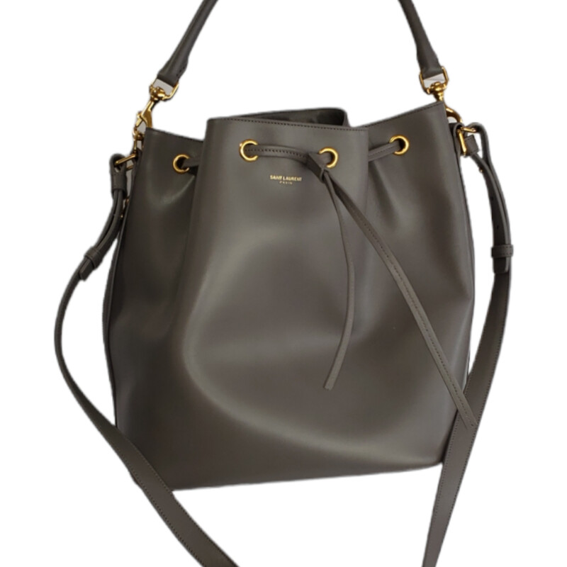 Yves Saint Laurent Emmanual Bucket Bag<br />
<br />
Color: Grey<br />
<br />
Condition: Like New<br />
<br />
Material: Leather<br />
<br />
Size: Bucket