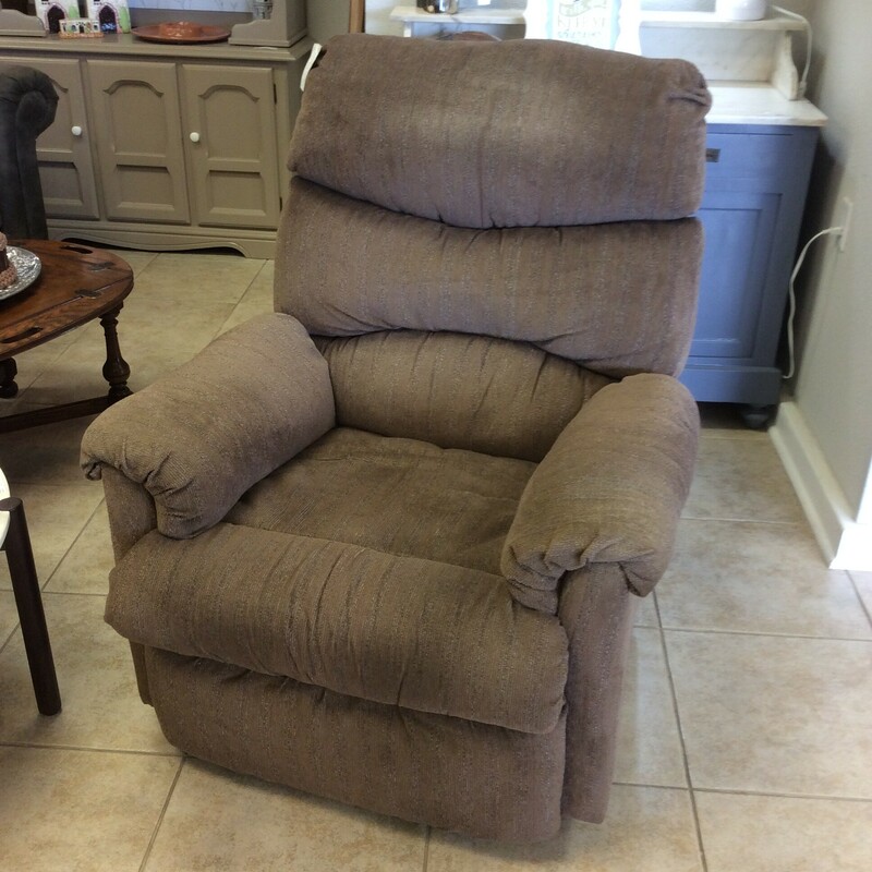 This is a Brown cloth Frankin Recliner.  This recliner also swivels and rocks.