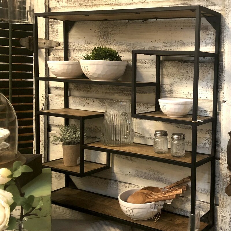 Iron/ Wood Wall Shelf
32 H x 32 L x 6.5 D
Introducing the Industrial Chic Wall Ensemble - a trendy iron and wood shelving unit that's here to elevate your space with a perfect blend of rustic charm and modern flair!   The Industrial Chic Wall Ensemble brings together the raw appeal of iron with the warm embrace of wood, creating a harmonious symphony of textures and aesthetics.  A sensational accent to any wall!