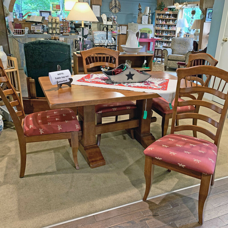 Trestle Table with 4 upholstered chairs and 2 leaves
Table measures 62 x 36 and 80 x 36 wiht the leaves  It is in great shape and the leaves slip in effortlessly .  The chairs are uholstered with a red material wiht dragonflies