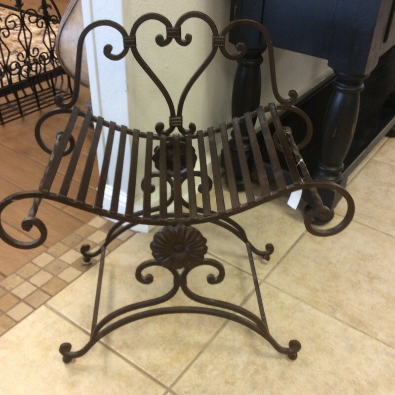This heavy gauge metal bench exudes charm and elegance. Could be used indoors or outdoors.