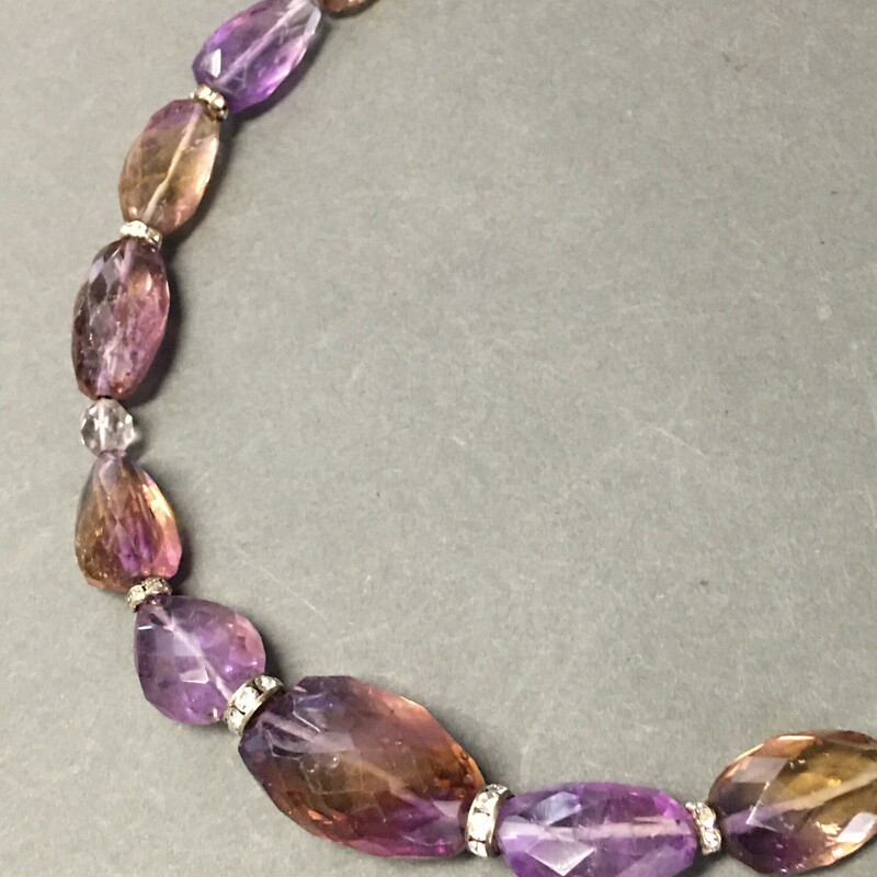 Amatrine Stones, Purple, Size: Necklace<br />
Necklace 20\". Amatrine stones,<br />
Rhinestone rondelles, Amethyst beads.<br />
$49.00<br />
Handmade by Eileen Settle