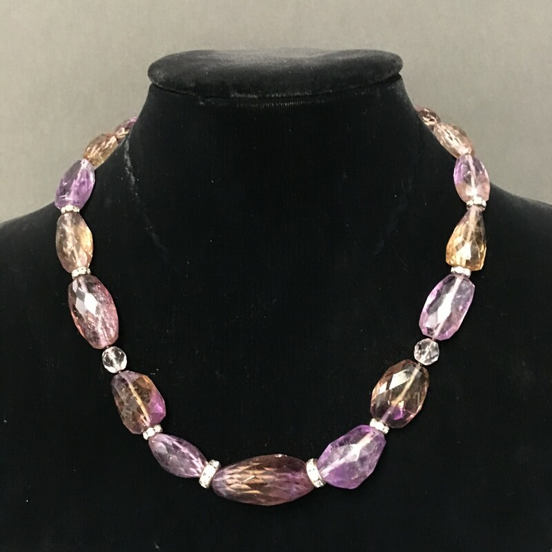 Amatrine Stones, Purple, Size: Necklace<br />
Necklace 20\". Amatrine stones,<br />
Rhinestone rondelles, Amethyst beads.<br />
$49.00<br />
Handmade by Eileen Settle