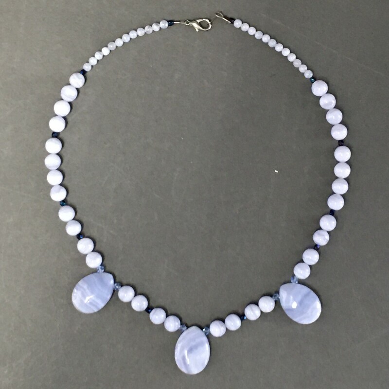 Blue Lace Agate, Lt Blue, Size: Necklace
Necklace 18.5\"  Blue Lace Agate,
teardrops and round stones, Swarovski
Bicone crystal spacers. $59.00
Handmade by Eileen Settle