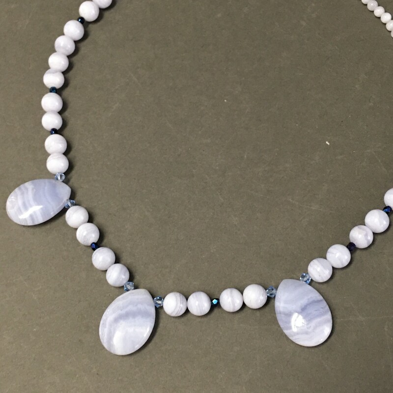 Blue Lace Agate, Lt Blue, Size: Necklace<br />
Necklace 18.5\"  Blue Lace Agate,<br />
teardrops and round stones, Swarovski<br />
Bicone crystal spacers. $59.00<br />
Handmade by Eileen Settle