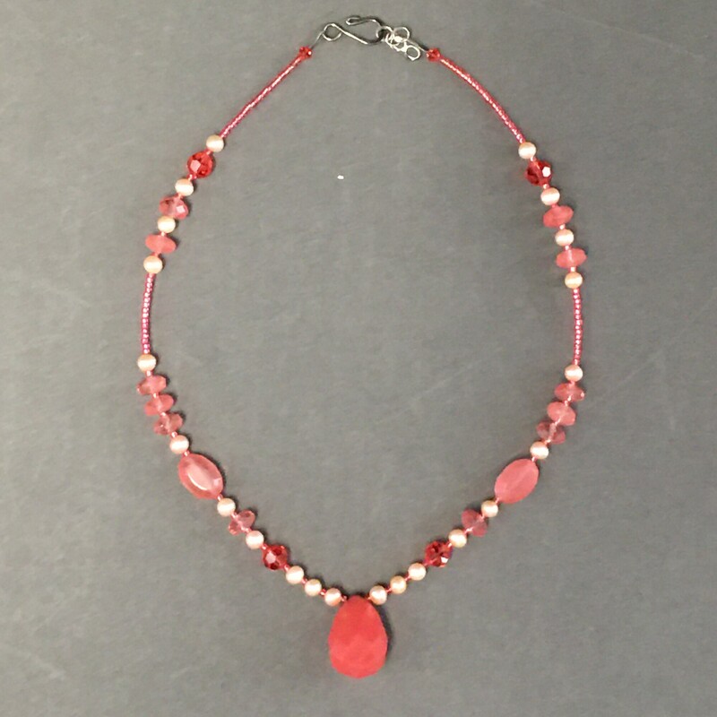 Padparadscha Glass, Multi, Size: Necklace<br />
Necklace 18\" Padparadscha glass<br />
pendant, cultured pearls, Swarovski<br />
crystals, glass beads. $45.00<br />
Handmade by Eileen Settle