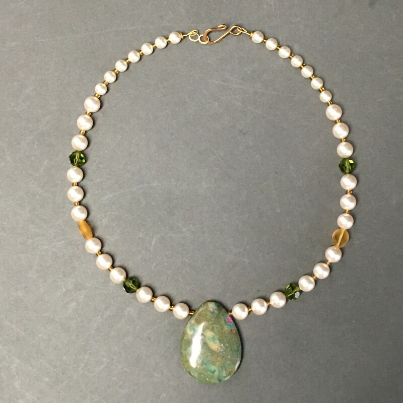 Zoisite Ruby Pearls, Multi, Size: Necklace<br />
Necklace 18\"<br />
Zoisite Ruby pendant, Pearls, Swarovski<br />
Olivine crystals and yellow glass beads.<br />
$45.00<br />
Handmade by Eileen Settle