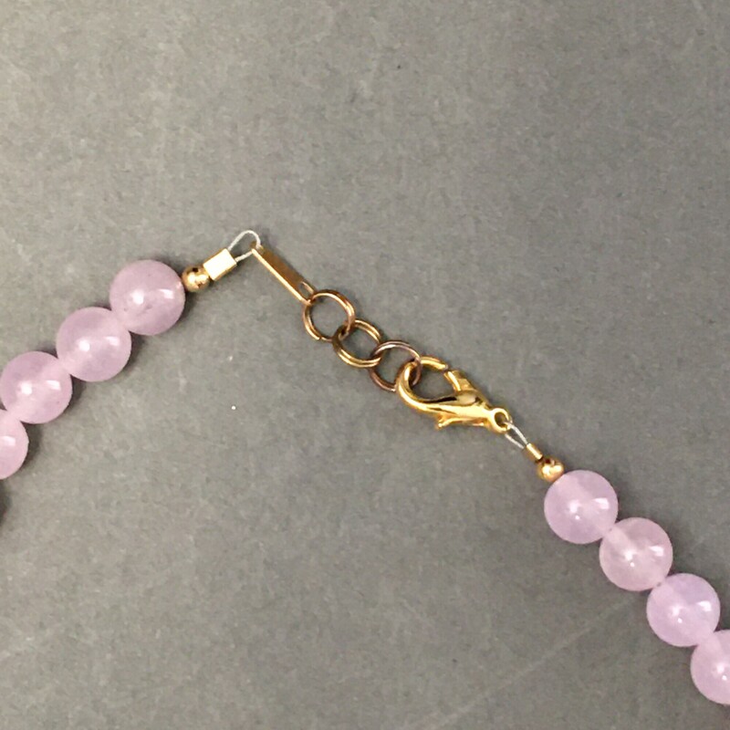 .Necklace 18\"-20\", Drop pierced earrings
Lavender fluorite, Charoite stones, gold
metal spacers. Sold as set $ $49.00
Handmade by Eileen Settle
